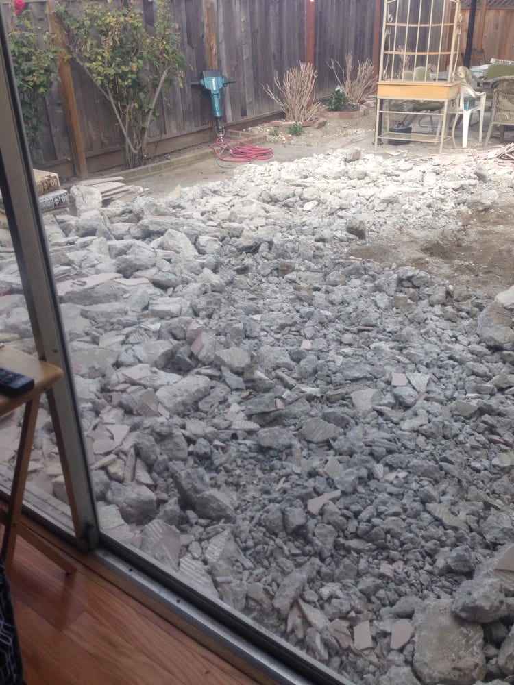 Concrete slab broken up and ready to haul